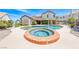 Expansive backyard featuring a large pool, spa, covered patio, and lush landscaping, ideal for entertaining at 364 Clark Dr, Henderson, NV 89074