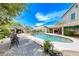 Gorgeous backyard showcasing a pool, spa, mature trees, and an inviting outdoor lounge area at 364 Clark Dr, Henderson, NV 89074