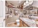 Unique bathroom with nautical-themed decor, granite countertops, and a well-lit mirror, adding character and charm at 364 Clark Dr, Henderson, NV 89074