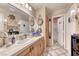 Bright bathroom with a wide vanity, tile floors, and modern lighting, creating a clean and welcoming space at 364 Clark Dr, Henderson, NV 89074