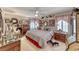 Spacious bedroom featuring a ceiling fan, generous storage, and plush decor, offering comfort and elegance at 364 Clark Dr, Henderson, NV 89074