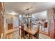 Cozy dining room with seamless flow to other rooms and natural light at 364 Clark Dr, Henderson, NV 89074