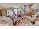 Comfortable living room featuring plush seating, decorative rugs, and stylish decor at 364 Clark Dr, Henderson, NV 89074