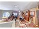 Comfortable living area with a ceiling fan, warm lighting, and various decor, offering a great space to relax and unwind at 364 Clark Dr, Henderson, NV 89074