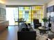 Bright living room with floor-to-ceiling windows, dining table and comfortable seating at 3722 S Las Vegas Blvd # 1111, Las Vegas, NV 89113