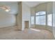 Spacious primary bedroom with ample natural light, a ceiling fan and unique architectural details at 3766 Port Ritchey St, Las Vegas, NV 89147
