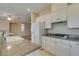 Beautiful kitchen with white cabinetry and granite countertops at 3766 Port Ritchey St, Las Vegas, NV 89147