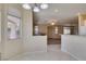 Open-concept view from the dining area to the spacious living room with fireplace at 3766 Port Ritchey St, Las Vegas, NV 89147