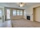 Cozy living room featuring a fireplace and access to the outdoor patio at 3766 Port Ritchey St, Las Vegas, NV 89147