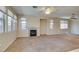 Spacious living room featuring a fireplace and neutral decor at 3766 Port Ritchey St, Las Vegas, NV 89147