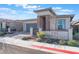 Charming single-story home featuring a welcoming courtyard and desert-friendly landscaping at 421 Point Sur Ave, Las Vegas, NV 89138