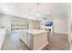 Spacious kitchen flows into the living area with a large island, ideal for entertaining and modern living at 421 Point Sur Ave, Las Vegas, NV 89138