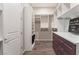 Spacious walk-in closet featuring custom shelves, drawers, and hanging space for optimal storage solutions at 421 Point Sur Ave, Las Vegas, NV 89138