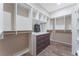 Walk-in closet boasts custom shelving and drawers, maximizing storage potential at 421 Point Sur Ave, Las Vegas, NV 89138
