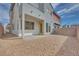 Backyard featuring a covered patio, gravel ground cover, and a private fenced area at 4349 Tabor Peak Ave, Las Vegas, NV 89141