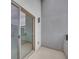 Private balcony with a sliding glass door and textured gray exterior wall at 4349 Tabor Peak Ave, Las Vegas, NV 89141