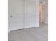 Carpeted bedroom with large closet doors and doorway to the rest of the house at 4349 Tabor Peak Ave, Las Vegas, NV 89141
