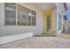 Back patio showing yellow door and brick pavers at 4349 Tabor Peak Ave, Las Vegas, NV 89141