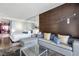 Open concept suite features a Queen bed, sitting area, and work space at 4381 W Flamingo Rd # 3710, Las Vegas, NV 89103