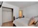 Bedroom features neutral carpet, white walls, and a closet at 5220 Shasta Daisy St, North Las Vegas, NV 89031