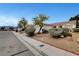 Street view of a charming single-story home with well-maintained landscaping at 5220 Shasta Daisy St, North Las Vegas, NV 89031