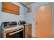 Laundry room features a washer, dryer, and access door at 5220 Shasta Daisy St, North Las Vegas, NV 89031