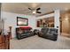 Spacious living room featuring tile floors, neutral decor and large windows at 5220 Shasta Daisy St, North Las Vegas, NV 89031
