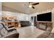 Bright living area featuring tile floors, neutral paint and cozy furnishings at 5220 Shasta Daisy St, North Las Vegas, NV 89031