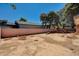 Backyard featuring a large open space with a brick wall in the background at 5274 Somerset Dr, Las Vegas, NV 89120