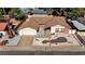 Charming single-story home featuring a front yard with minimal landscaping, attached garage and neutral color palette at 5274 Somerset Dr, Las Vegas, NV 89120