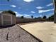 Backyard area features a storage shed and concrete patio at 5460 Conville Pl, Las Vegas, NV 89120