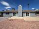 Home exterior and backyard showcasing a concrete patio and low-maintenance landscaping at 5460 Conville Pl, Las Vegas, NV 89120