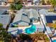 Aerial view of backyard pool, lifeguard tower, and synthetic grass area at 6181 Cedarwood Ave, Las Vegas, NV 89103