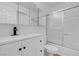 Modern bathroom featuring a sleek vanity, black hardware, and a glass-enclosed shower at 6181 Cedarwood Ave, Las Vegas, NV 89103