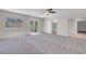 Bright bedroom with carpet, backyard views, and access to the pool and backyard at 6181 Cedarwood Ave, Las Vegas, NV 89103