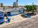 Charming single-story home featuring an attached garage and a beautiful yard from an aerial perspective at 6181 Cedarwood Ave, Las Vegas, NV 89103