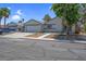 Lovely single-story home with an attached garage, tidy landscaping, and appealing curb presence at 6181 Cedarwood Ave, Las Vegas, NV 89103