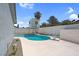 Backyard pool with diving board and lifeguard tower at 6181 Cedarwood Ave, Las Vegas, NV 89103