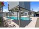 Backyard featuring an in-ground pool, diving board, and covered patio at 6181 Cedarwood Ave, Las Vegas, NV 89103