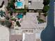 Aerial view showcasing the home's backyard with a custom pool, waterfall feature, and manicured landscaping at 6224 Red Pine Ct, Las Vegas, NV 89130