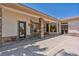 Expansive covered back patio featuring stone pillars and outdoor living space at 6224 Red Pine Ct, Las Vegas, NV 89130