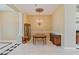 Formal dining room features decorative ceiling and elegant wooden furniture at 6224 Red Pine Ct, Las Vegas, NV 89130