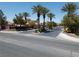 Gated community entrance with well-maintained landscaping and a secure, welcoming atmosphere for residents and guests at 6224 Red Pine Ct, Las Vegas, NV 89130