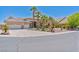 Charming single story home with desert landscaping, circular driveway, and three car garage at 6224 Red Pine Ct, Las Vegas, NV 89130