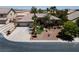 Charming home showcasing lush landscaping, mature trees, and a well-maintained front yard in a desirable neighborhood at 6224 Red Pine Ct, Las Vegas, NV 89130