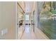 Hallway showing mirrored closet doors which reflect the bathroom area at 6224 Red Pine Ct, Las Vegas, NV 89130
