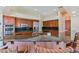 Spacious kitchen featuring stainless steel appliances, a granite countertop, and plenty of storage space at 6224 Red Pine Ct, Las Vegas, NV 89130