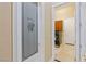 Walk-in pantry door, laundry room visible with washer and dryer inside at 6224 Red Pine Ct, Las Vegas, NV 89130