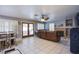 Cozy living space includes a fireplace, neutral paint, plantation shutters, and tile floors at 6259 Santander Ave, Las Vegas, NV 89103