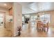 Open-concept dining room with a chandelier, tile floors, and easy access to living areas at 6559 Musette Ave, Las Vegas, NV 89139